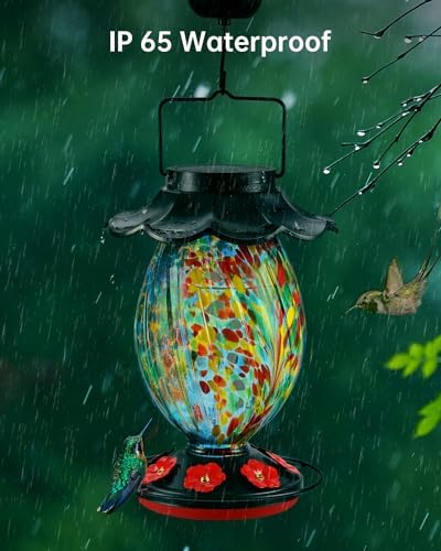 Solar Hummingbird Feeder - 49 fl.oz Hand Blown Glass Color Changing - 7 Feeding Ports with Perch - Never Leak - Perfect Hummingbird Feeder for Outdoors Hanging (Blue)