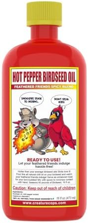 CreatureCops⢠Spicy Squirrel Seed Sauce | All-Natural & Squirrel-Resistant Hot Pepper Bird Seed Oil | Flaming Hot Sauce - Seasons >60lb per 16oz Bottle