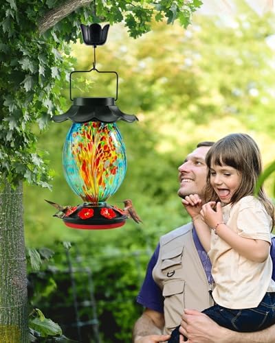 Solar Hummingbird Feeder - 49 fl.oz Hand Blown Glass Color Changing - 7 Feeding Ports with Perch - Never Leak - Perfect Hummingbird Feeder for Outdoors Hanging (Blue)