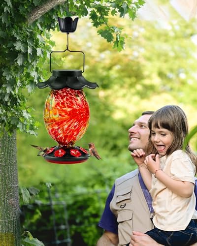 Solar Hummingbird Feeder - 49 fl.oz Hand Blown Glass Color Changing - 7 Feeding Ports with Perch - Never Leak - Perfect Hummingbird Feeder for Outdoors Hanging (Red)