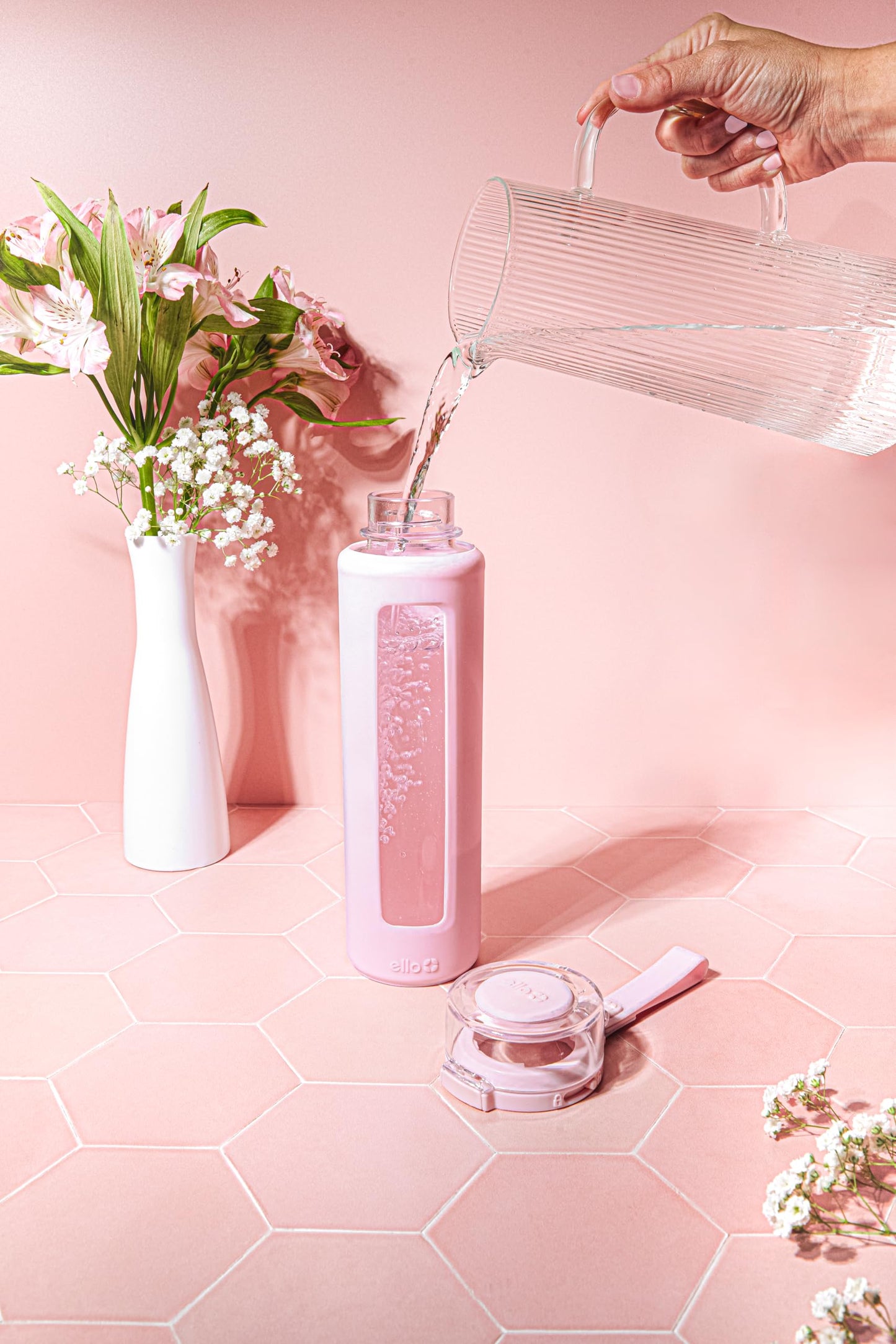 Ello Syndicate 20oz Reusable Glass Water Bottle with One-Touch Leak Proof Flip Lid, Protective Non-Slip Silicone Sleeve, Carry Loop for Coffee, Tea and Water, BPA-free, Dishwasher Safe, Cashmere Pink