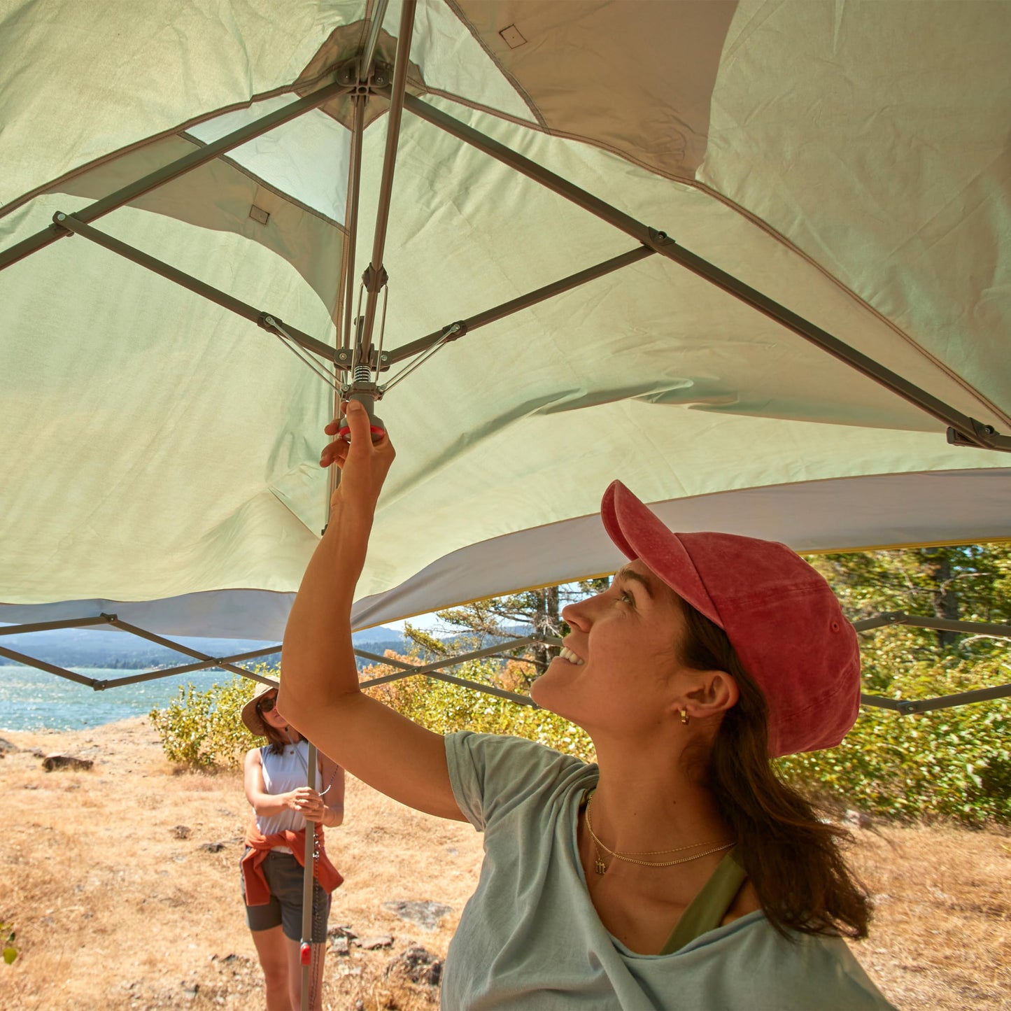 Coleman Oasis Instant Pop-Up Canopy Tent with Side Wall Attachment, Portable Shelter with Easy Setup & Takedown, Wheeled Carry Bag Included, 10x10/13x13ft Sizes