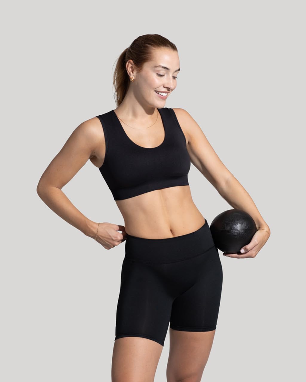 Tommie Copper Seamless Compression Bra with Back Support - Wireless, Soft and Stretchy Posture Corrector - Black, Small