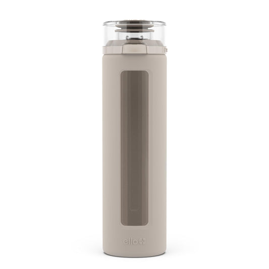 Ello Syndicate 20oz Reusable Glass Water Bottle with One-Touch Leak Proof Flip Lid, Protective Non-Slip Silicone Sleeve, Carry Loop for Coffee, Tea and Water, BPA-free, Dishwasher Safe, Sand