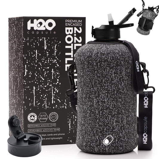H2O Capsule 2.2L Half Gallon Water Bottle with Storage Sleeve and Covered Straw Lid – BPA Free Large Reusable Drink Container with Handle - Big Sports Jug, 2.2 Liter (74 Ounce) Cosmic Rain
