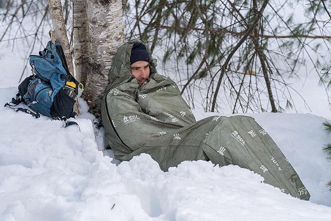 SOL Escape Bivvy with Hood - Emergency Preparedness Blanket - Reflects Up to 70% Body Heat - Outdoor Survival Bivvy - Water Resistant - Durable & Breathable - Winter Camping Supplies - Green
