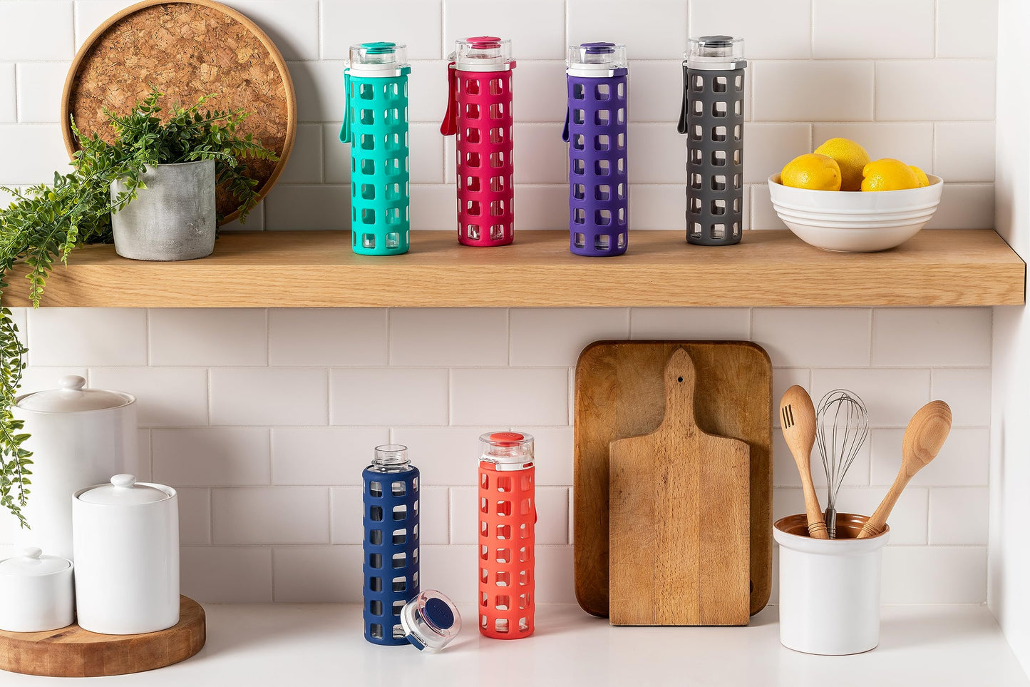 Ello Syndicate Glass Water Bottle with One-Touch Flip Lid and Protective Silicone Sleeve and Carry Loop, BPA Free, Dishwasher Safe, Coral, 20oz